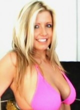 Emily takes off her bright pink bikini and teases with her big natural G cups
