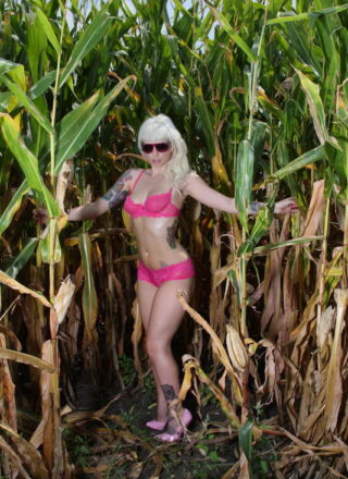 Lynn Pops Sunbathing In The Cornfield With Her Pink Sunglasses On