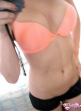 Diddy Takes Self Pictures Of Herself In A Bright Orange Bra