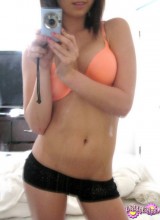 Diddy Takes Self Pictures Of Herself In A Bright Orange Bra