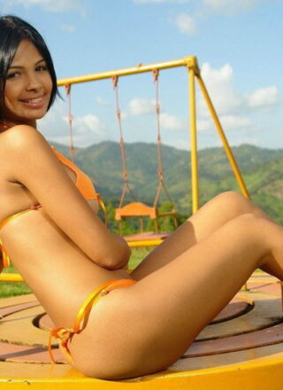 Karla Spice Gets Naughty And Playful At The Playground In Her Orange Bikini