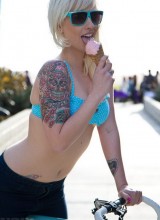 Check out the fetish queen Lynn Pops ridin her fixed gear bike, lickin ice cream and showin off her toesies