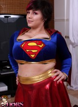 Big Tit Star Dors Feline Squeezes Her Huge Tits Into Her Superwoman Costume