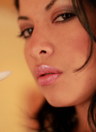 Natalia Spice Enjoys The Sweet Taste Of A Treat As She Dances On A Pole