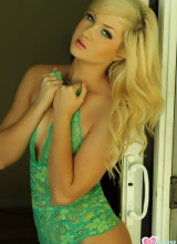 Ashlie Madison in a sexy green lace onesie