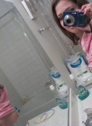 Share My Gf: Cali Logan Takes Naked Selfshot Pictures In The Mirror