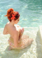 Lucy Vixen Strips From Her Floral Bikini In The Pool