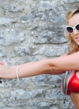 Jodie Gasson Seduces Us Outdoors In Her Red Bikini With Her Blaster Gun At Hand