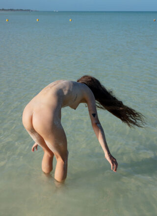 Irene Rouse Spreads in the Sand 1